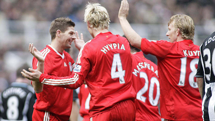 Liverpool's Sami Hyypia (C) celebrates s