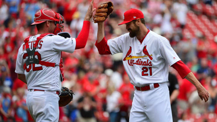 Cardinals pitcher Andrew Miller, right, celebrates a save with Wieters following a win over the Dodgers.