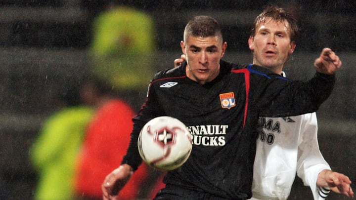Lyon's French forward Karim Benzema (L)