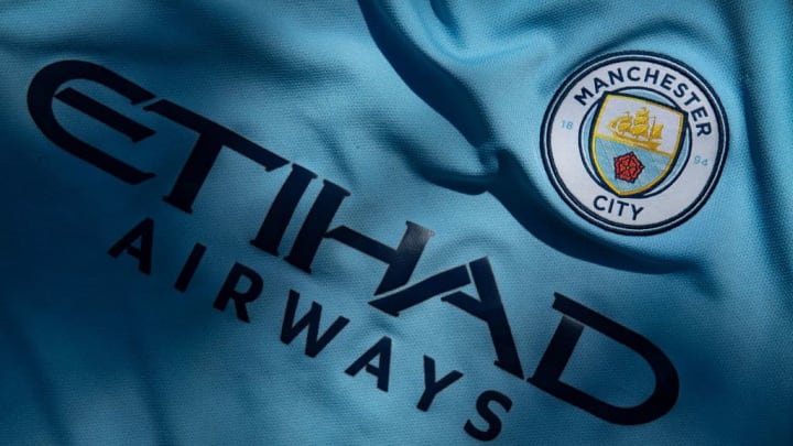 Manchester City Club Crest and Etihad Airways