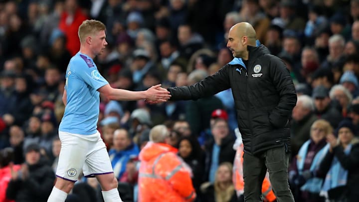 Kevin De Bruyne (kiri) & Pep Guardiola (kanan) / Manchester City Kevin De Bruyne (kiri) & Pep Guardiola (kanan) / Manchester City