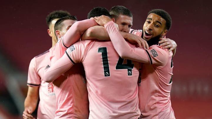 Sheffield United celebrate Oliver Burke's winning goal at Old Trafford
