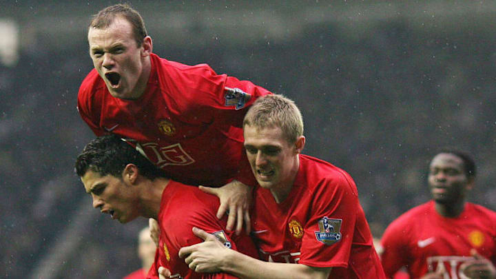 Manchester United's Wayne Rooney (Up), C