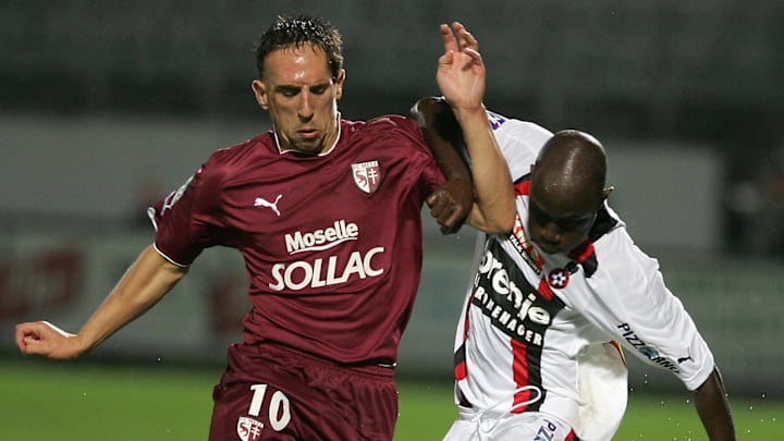 Metz's midfielder Franck Ribery (L) figh