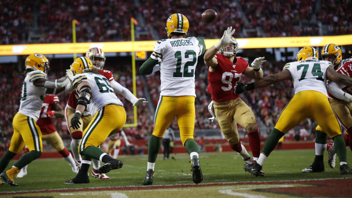Packers quarterback Aaron Rodgers releases a pass backed up against his own end zone in the NFC Championship against the 49ers. Packers quarterback Aaron Rodgers releases a pass backed up against his own end zone in the NFC Championship against the 49ers.