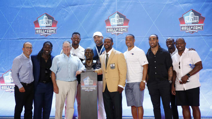 Ty Law and Patriots team mates at the NFL Hall of Fame Enshrinement Ceremony in February 2019