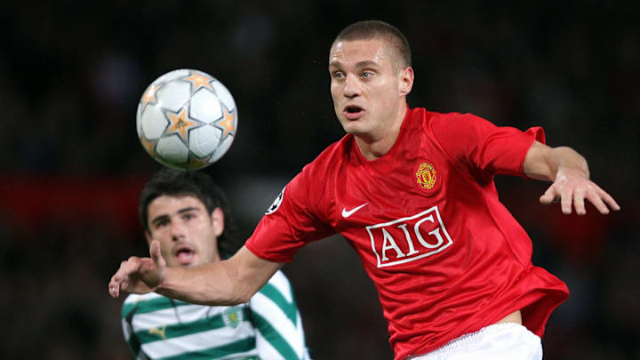 Nemanja Vidic (R) of Manchester United