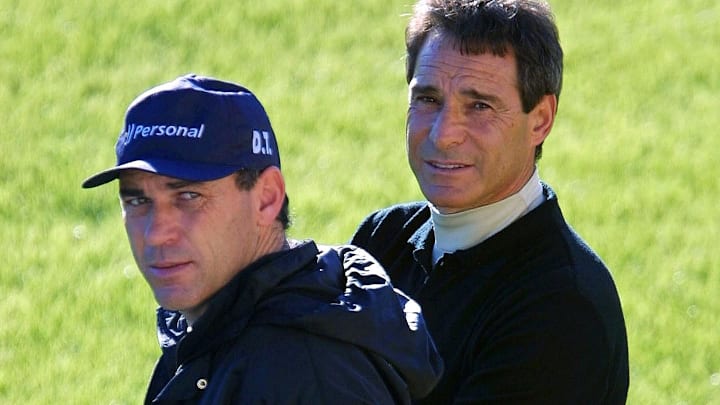 Nery Pumpido (L), coach of the Olimpia team, and P