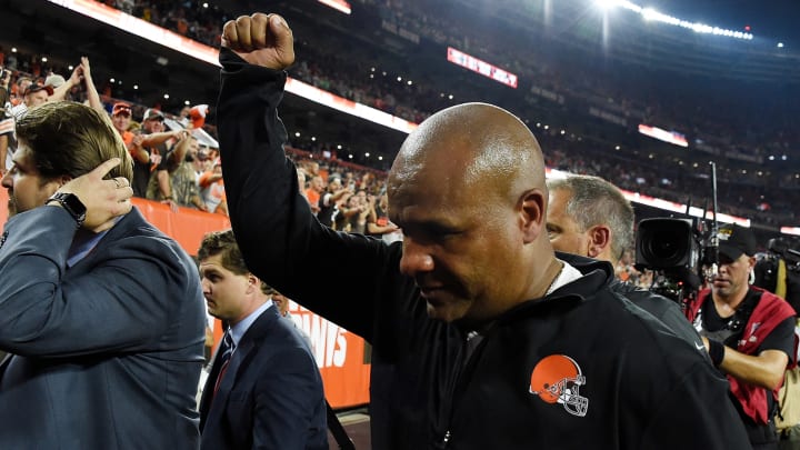 Hue Jackson walks off the field following a game against the New York Jets.