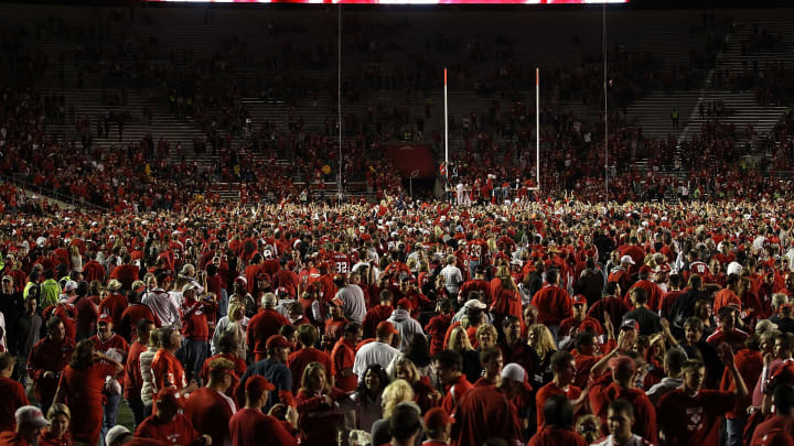 Wisconsin fans storm the field against Ohio State.