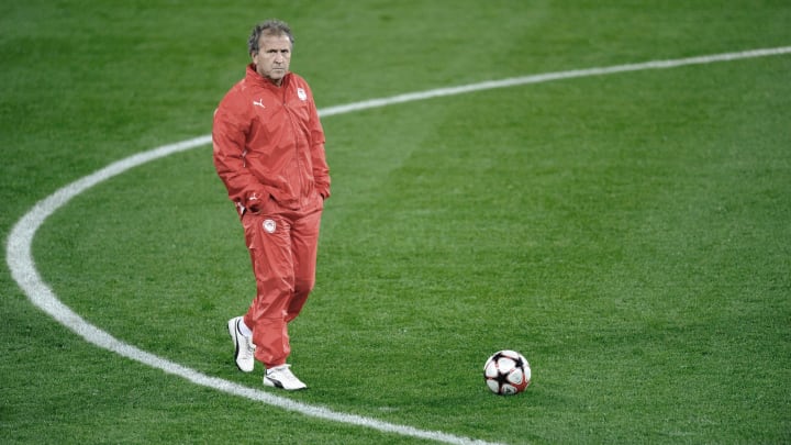 Olympiacos's coach Zico walks during a t