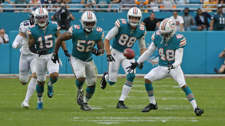 Miami Dolphins players attempt to recover an onside kick against the Philadelphia Eagles
