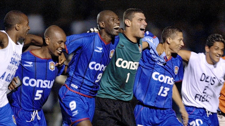 Players of the Sao Caetano, celebrate with goal ke
