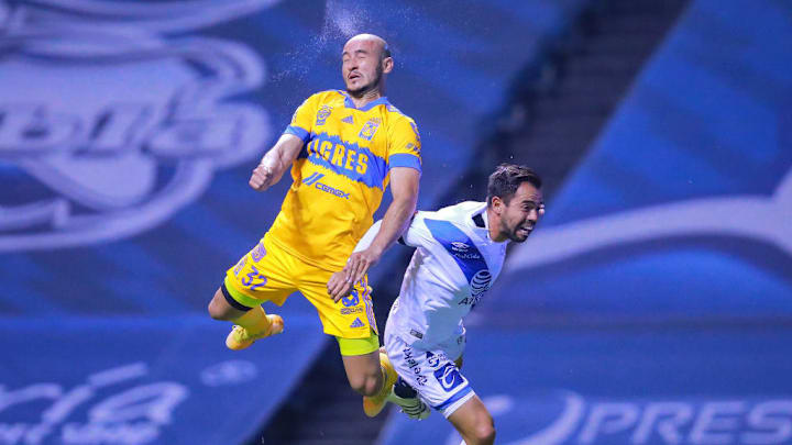 Carlos González, George Corral