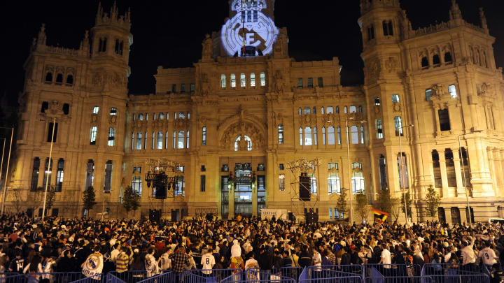 Real Madrid supporters celebrate around Real Madrid supporters celebrate around