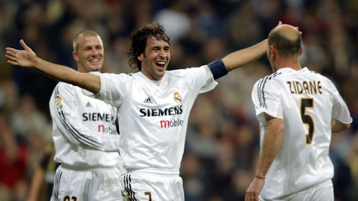 Real Madrid's Raul (C) celebrates his go