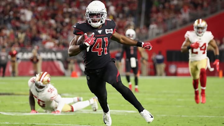 Kenyan Drake runs the ball against the 49ers.