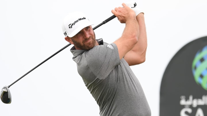 Dustin Johnson tees off during the Saudi International - Day Two.