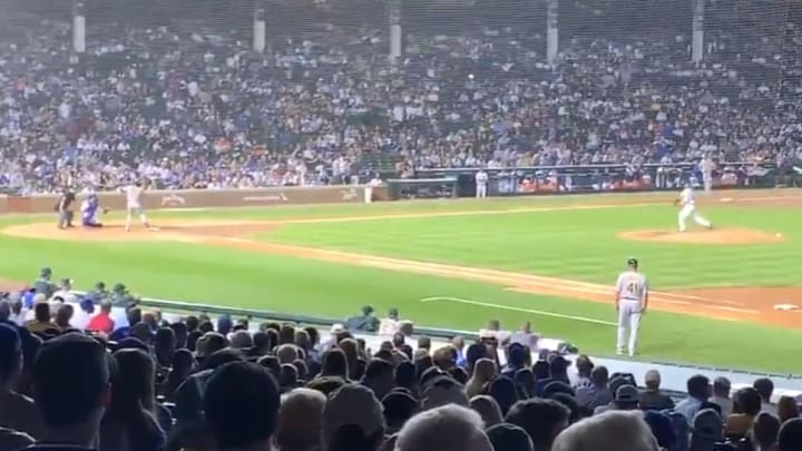 Taylor Davis pitches to Kyle Schwarber in Tuesday's game against the Athletics. Taylor Davis pitches to Kyle Schwarber in Tuesday's game against the Athletics.