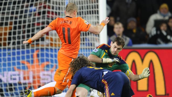 Spain's goalkeeper Iker Casillas (in gre