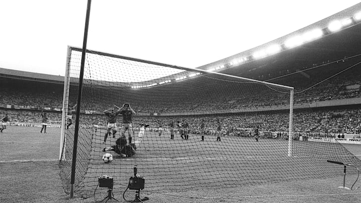 Spanish goalkeeper Luis Arconada dives in vain to