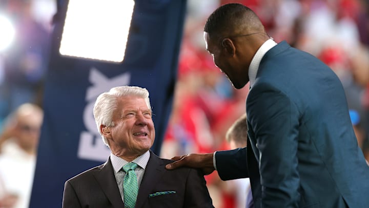 Jimmy Johnson, left, is greeted by Michael Strahan on the set of FOX's Super Bowl LIV coverage Jimmy Johnson, left, is greeted by Michael Strahan on the set of FOX's Super Bowl LIV coverage