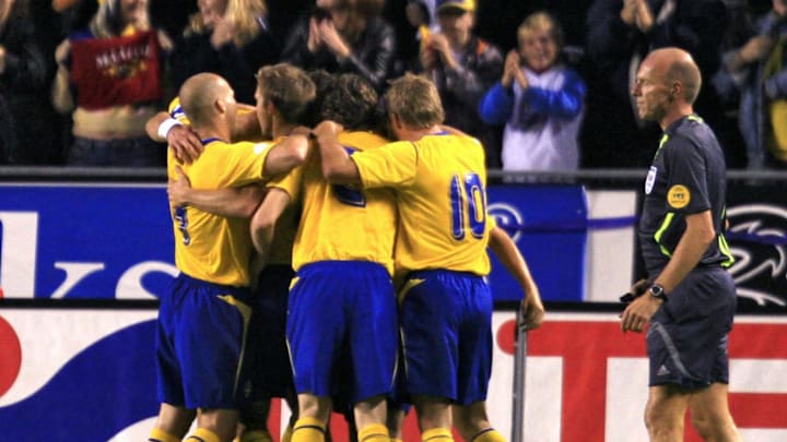 Swedich players celebrate their 1-0 goal