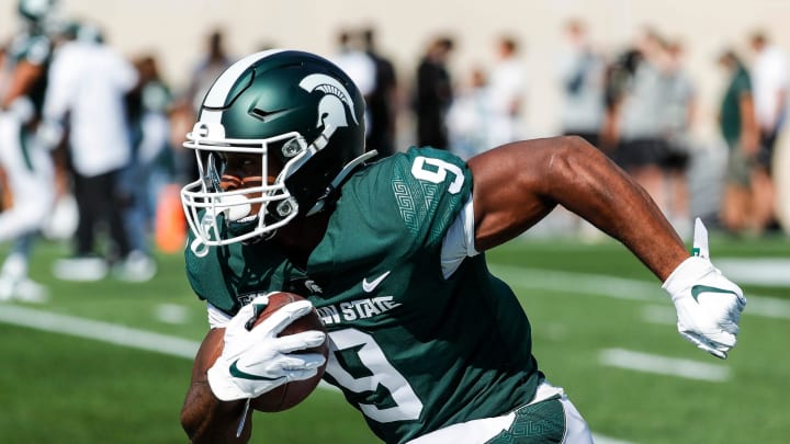 Bettors have been jumping on board with Kenneth Walker III and the Michigan State Spartans when they travel to Miami to face the Hurricanes.