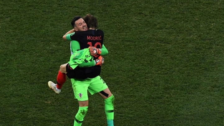 Subasic celebrates Croatia's penalty shootout victory over Denmark