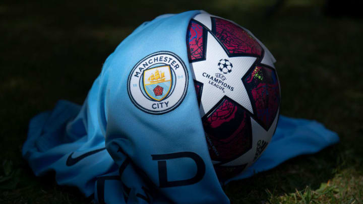 The Manchester City Club Crest with a Premier League Match Ball