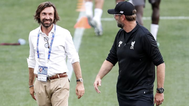 Andrea Pirlo, yang baru saja terpilih sebagai pelatih baru Juventus, berbincang dengan Jurgen Klopp Andrea Pirlo, yang baru saja terpilih sebagai pelatih baru Juventus, berbincang dengan Jurgen Klopp