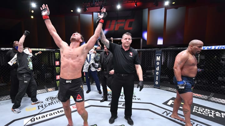 Stipe Miocic and Daniel Cormier after UFC 252.