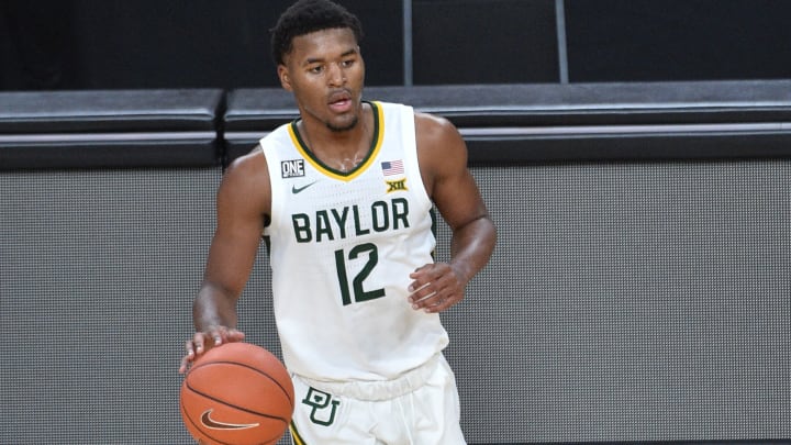 Kansas vs Baylor spread, line, odds, predictions, over/under & betting insights for college basketball game. 