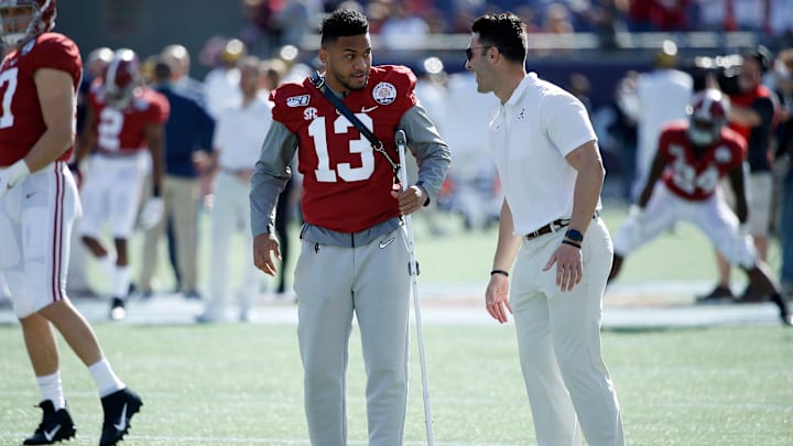 Tua Tagovailoa walking in warm-ups before a game vs. Michigan