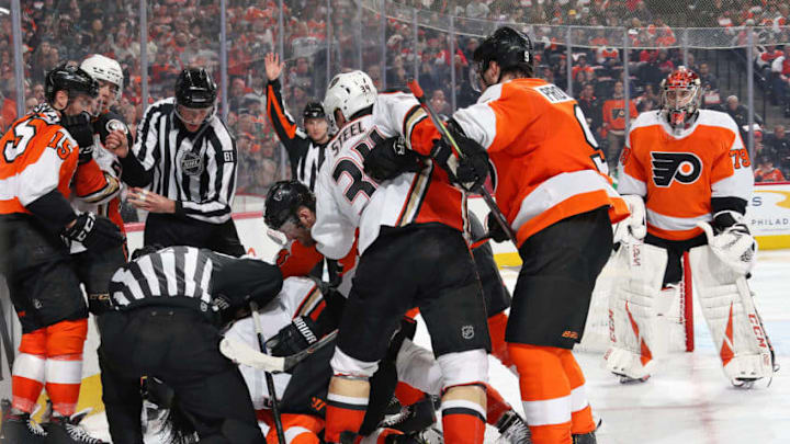 PHILADELPHIA, PA - DECEMBER 17: A scrum ensues in the third period at an NHL game between the Philadelphia Flyers and the Anaheim Ducks on December 17, 2019 at the Wells Fargo Center in Philadelphia, Pennsylvania. (Photo by Len Redkoles/NHLI via Getty Images)