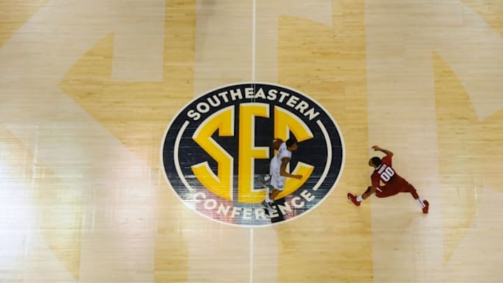 Mar 15, 2015; Nashville, TN, USA; Kentucky Wildcats guard Tyler Ulis (3) works against Arkansas Razorbacks guard Rashad Madden (00) during the second half of the SEC Conference Championship game at Bridgestone Arena. Kentucky won 78-63. Mandatory Credit: Christopher Hanewinckel-USA TODAY Sports