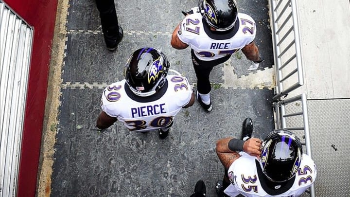 December 9, 2012; Landover, MD, USA; Baltimore Ravens running backs Ray Rice (27) , Bernard Pierce (30) and Anthony Allen (35) walk onto the field prior to the game against the Washington Redskins at FedEx Field. Mandatory Credit: Evan Habeeb-USA TODAY Sports