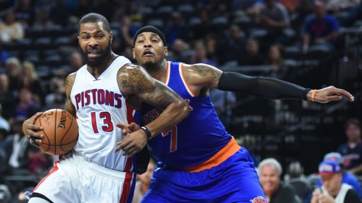 Nov 1, 2016; Auburn Hills, MI, USA; Detroit Pistons forward Marcus Morris (13) drives to the basket as New York Knicks forward Carmelo Anthony (7) defends during the third quarter at The Palace of Auburn Hills. Mandatory Credit: Tim Fuller-USA TODAY Sports