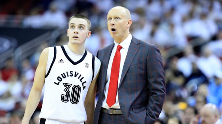 LOUISVILLE, KENTUCKY - FEBRUARY 02: Chris Mack the head coach of the Louisville Cardinals give instructions to Ryan McMahon #30 against the North Carolina Tar Heels at KFC YUM! Center on February 02, 2019 in Louisville, Kentucky. (Photo by Andy Lyons/Getty Images)