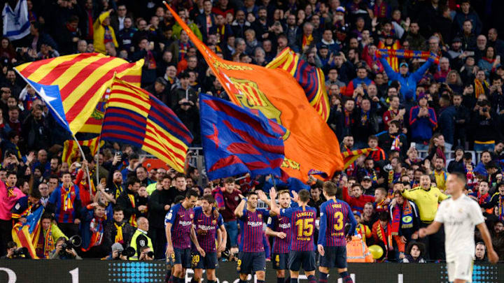 Barcelona's Uruguayan forward Luis Suarez (C) celebrates his second goal with teammates during the Spanish league football match between FC Barcelona and Real Madrid CF at the Camp Nou stadium in Barcelona on October 28, 2018. (Photo by Josep LAGO / AFP) (Photo credit should read JOSEP LAGO/AFP/Getty Images)