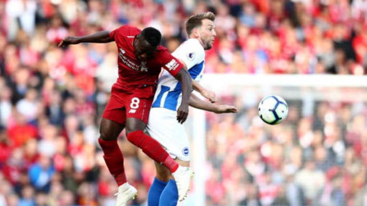 LIVERPOOL, ENGLAND – AUGUST 25: Naby Keita of Liverpool battles for posession in the air with Dale Stephens of Brighton and Hove Albion during the Premier League match between Liverpool FC and Brighton & Hove Albion at Anfield on August 25, 2018 in Liverpool, United Kingdom. (Photo by Jan Kruger/Getty Images)