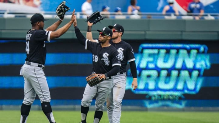 KANSAS CITY, MO - JUNE 09: Eloy Jimenez #74, Charlie Tilson #22 and Leury Garcia #28 of the Chicago White Sox celebrate the victory over the Kansas City Royals at Kauffman Stadium on June 09, 2019 in Kansas City, Missouri. (Photo by Kyle Rivas/Getty Images)