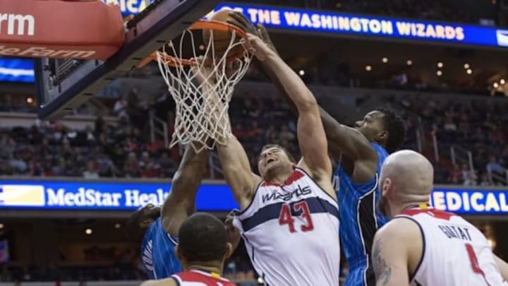 Feb 9, 2015; Washington, DC, USA; Washington Wizards forward Kris Humphries (43) shoots in between Orlando Magic forward Kyle O'Quinn (2) and forward Kyle O'Quinn (2) during the first quarter at Verizon Center. Mandatory Credit: Tommy Gilligan-USA TODAY Sports