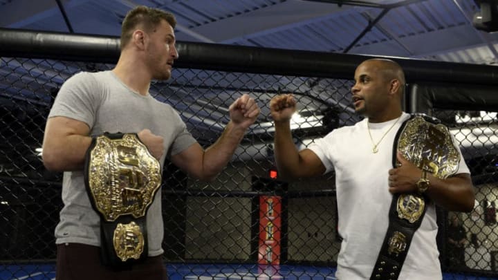 LAS VEGAS, NV - FEBRUARY 02: (L-R) Stipe Miocic and Daniel Cormier bump fists during the The Ultimate Fighter: Undefeated Cast