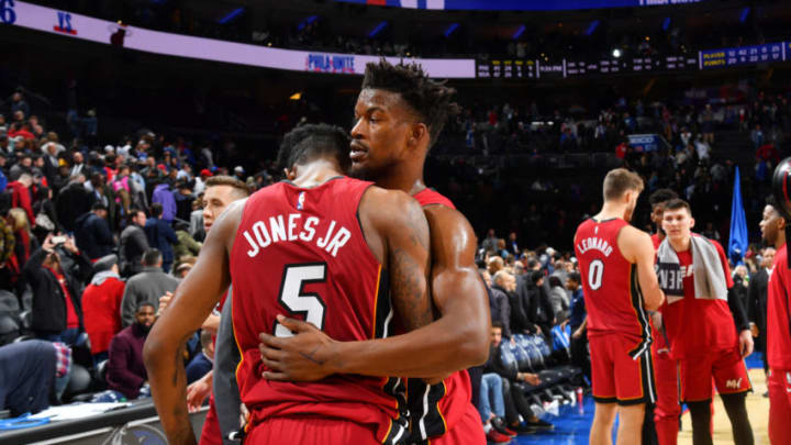 PHILADELPHIA, PA - DECEMBER 18: Derrick Jones Jr. #5 of the Miami Heat and Jimmy Butler #22 of the Miami Heat hug after a game against the Philadelphia 76ers on December 18, 2019 at the Wells Fargo Center in Philadelphia, Pennsylvania NOTE TO USER: User expressly acknowledges and agrees that, by downloading and/or using this Photograph, user is consenting to the terms and conditions of the Getty Images License Agreement. Mandatory Copyright Notice: Copyright 2019 NBAE (Photo by Jesse D. Garrabrant/NBAE via Getty Images)