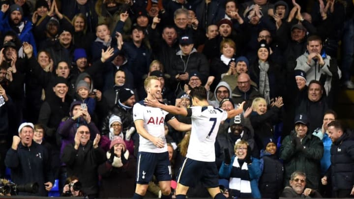 LONDON, ENGLAND - DECEMBER 03: Harry Kane (L) of Tottenham Hotspur celebrates scoring his team's third goal with his team mate Heung-Min Son (R)during the Premier League match between Tottenham Hotspur and Swansea City at White Hart Lane on December 3, 2016 in London, England. (Photo by Tony Marshall/Getty Images)