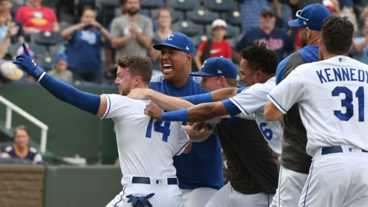 KANSAS CITY, MISSOURI - SEPTEMBER 29: Brett Phillips #14 of the Kansas City Royals celebrates his game-winning sacrifice fly with teammates in the ninth inning against the Minnesota Twins at Kauffman Stadium on September 29, 2019 in Kansas City, Missouri. The Royals won 5-4. (Photo by Ed Zurga/Getty Images)
