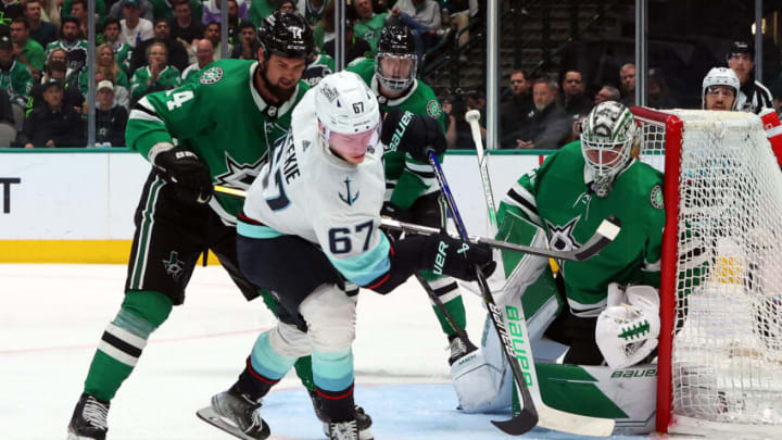 DALLAS, TEXAS - MAY 15: Morgan Geekie #67 of the Seattle Kraken tries to take a shot on Jake Oettinger #29 of the Dallas Stars in the second period in Game Seven of the Second Round of the 2023 Stanley Cup Playoffs at American Airlines Center on May 15, 2023 in Dallas, Texas. (Photo by Richard Rodriguez/Getty Images)