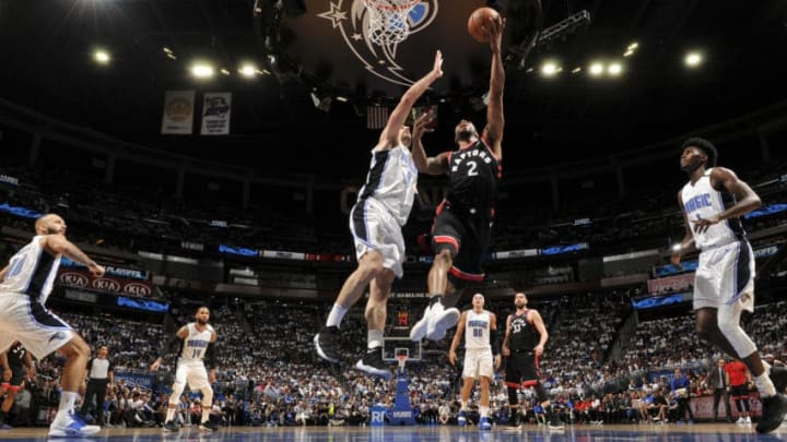 ORLANDO, FL - APRIL 21: Kawhi Leonard #2 of the Toronto Raptors drives to the basket for shot against the Orlando Magic during Game Four of Round One of the 2019 NBA Playoffs on April 21, 2019 at Amway Center in Orlando, Florida. NOTE TO USER: User expressly acknowledges and agrees that, by downloading and or using this photograph, User is consenting to the terms and conditions of the Getty Images License Agreement. Mandatory Copyright Notice: Copyright 2019 NBAE (Photo by Fernando Medina/NBAE via Getty Images)