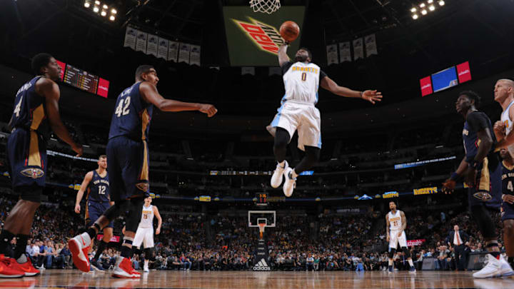 DENVER, CO - APRIL 7: Emmanuel Mudiay #0 of the Denver Nuggets goes up for a dunk against the New Orleans Pelicans on April 7, 2017 at the Pepsi Center in Denver, Colorado. NOTE TO USER: User expressly acknowledges and agrees that, by downloading and/or using this Photograph, user is consenting to the terms and conditions of the Getty Images License Agreement. Mandatory Copyright Notice: Copyright 2017 NBAE (Photo by Garrett Ellwood/NBAE via Getty Images)
